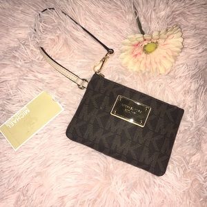 Brown Michael Kors wallet with logo